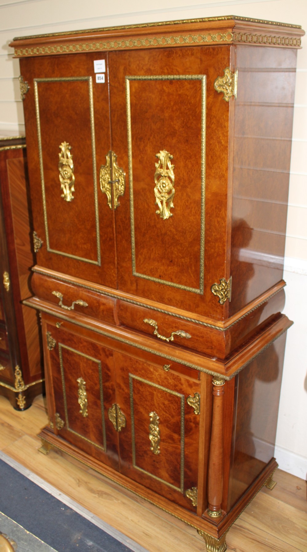 A Meuble Francais gilt metal mounted burrwood cocktail cabinet, W.86cm D.43cm H.158cm